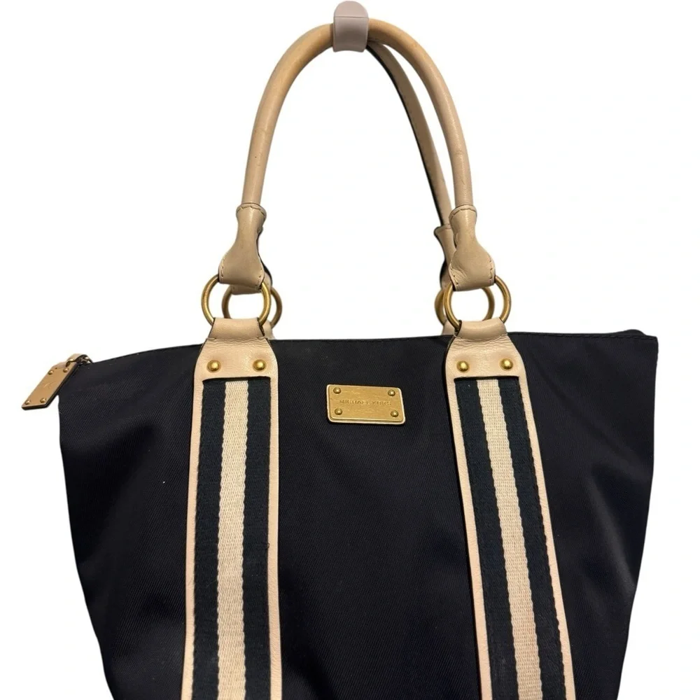 Michael Kors Black and Tan Tote with Structured Design